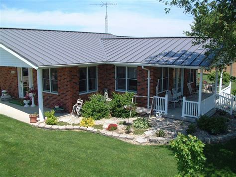 red brick ranch house new metal roof|metal roof for red brick house.